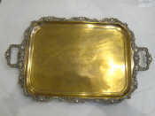 Appraisal: A large two handled silver plated tray with applied scrolling