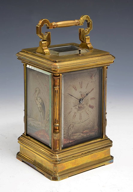 Appraisal: A TH CENTURY FRENCH CARRIAGE CLOCK the silvered Roman dial