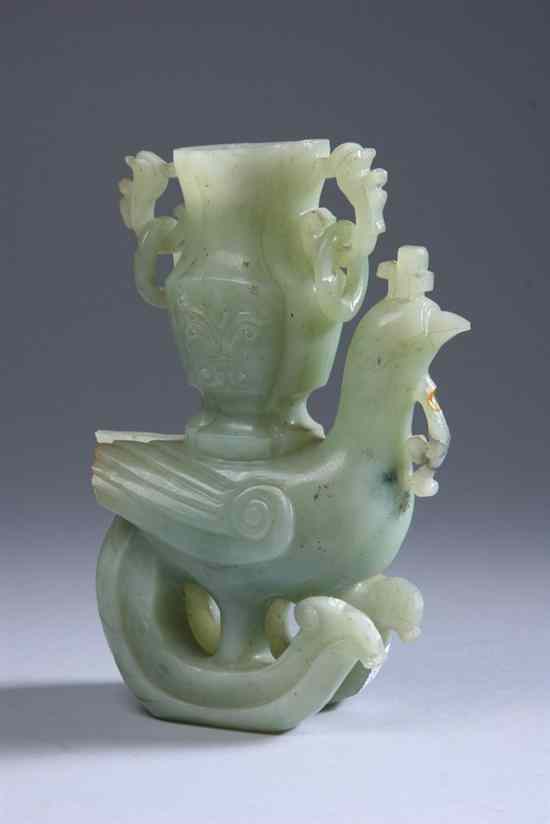 Appraisal: CHINESE CELADON JADE FIGURAL VASE Carved on bird-form base with