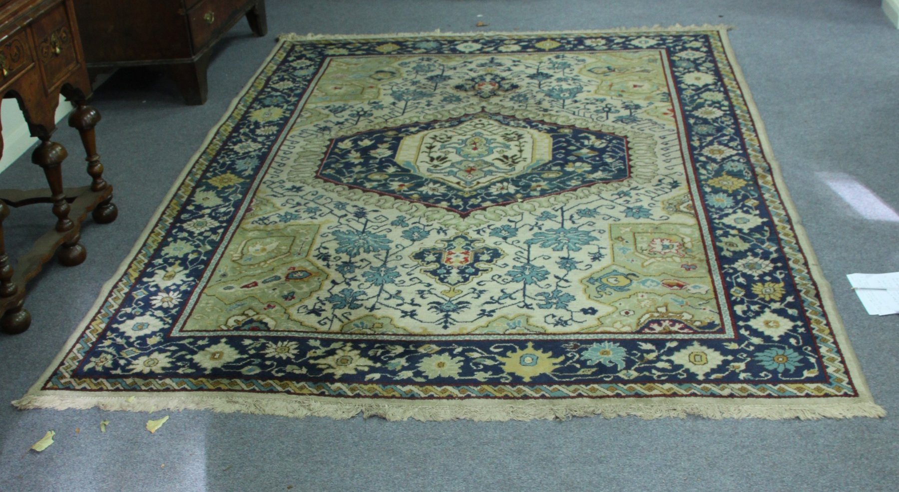 Appraisal: A Caucasian carpet the central indigo medallion on an ivory