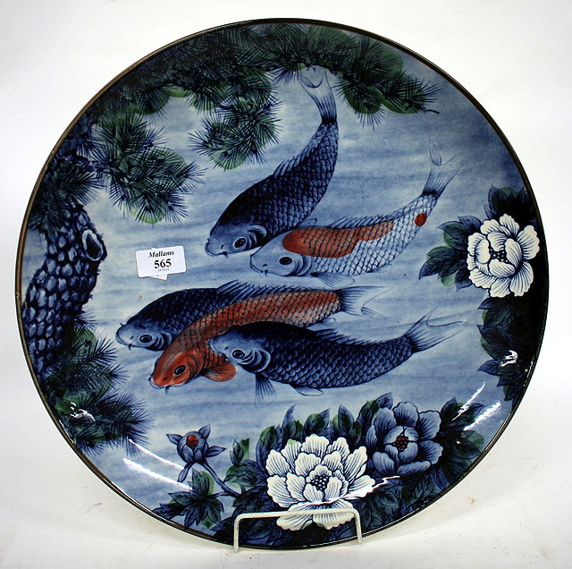 Appraisal: AN ORIENTAL CHARGER or large dish decorated with carp in