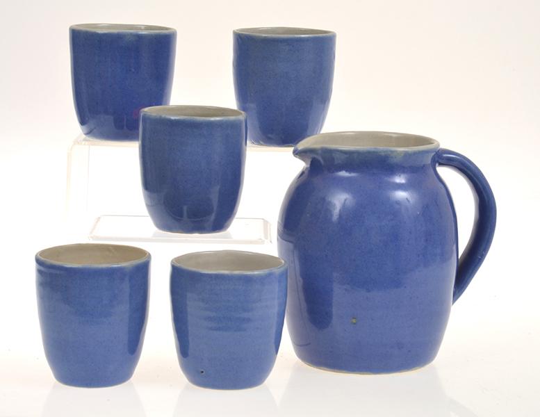 Appraisal: HAROLD HUGHAN JUG AND FIVE TUMBLERS IN BLUE