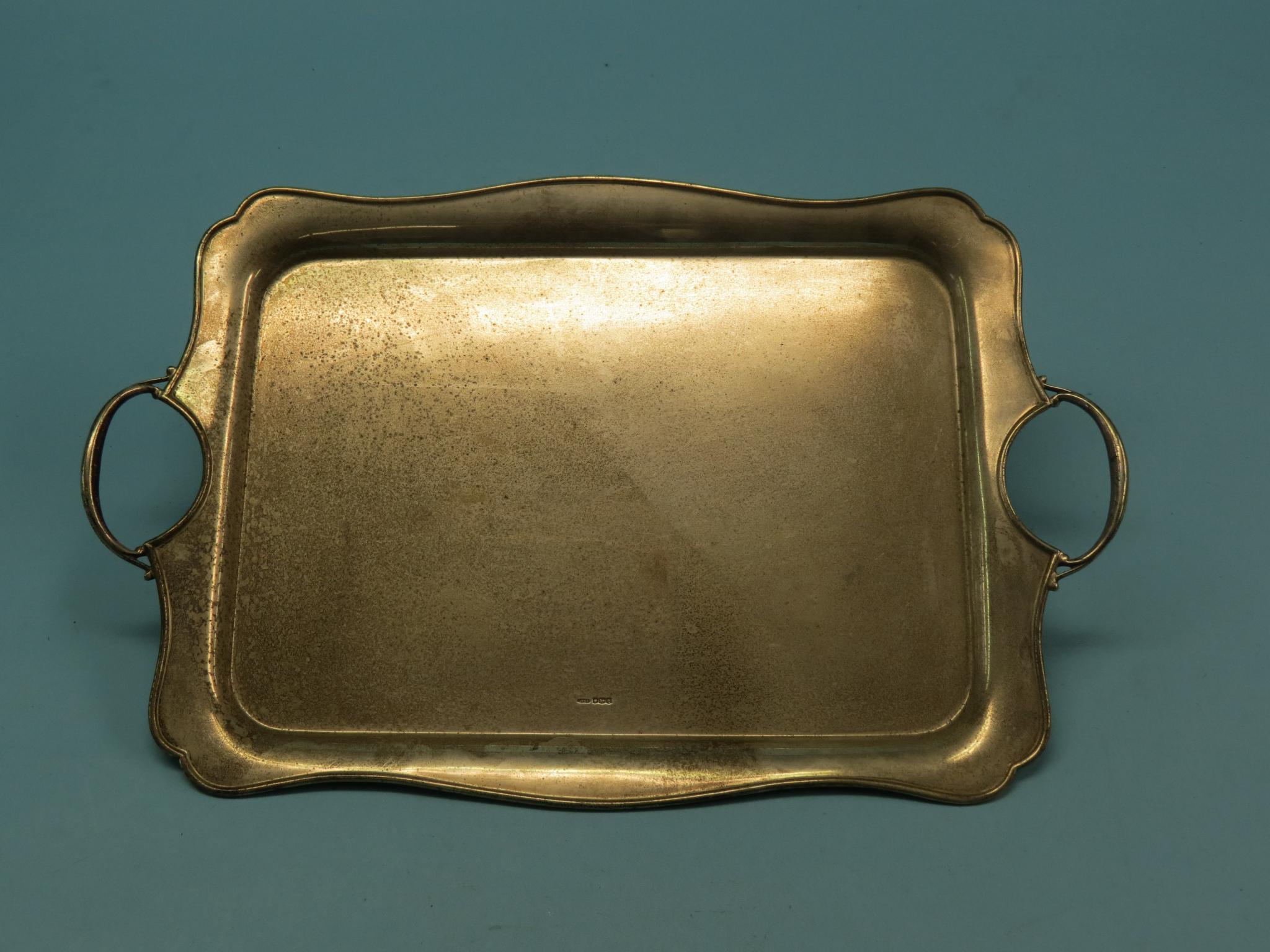 Appraisal: A large silver tray rectangular ogee shape with twin handles