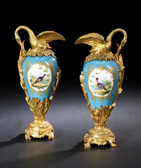 Appraisal: Attractive Pair of French Gilt-Bronze-Mounted Porcelain Ewers in the Sevres