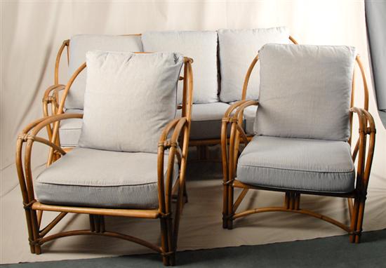 Appraisal: Heywood-Wakefield Rattan Settee and Two Armchairs with Ticking Cushions partial