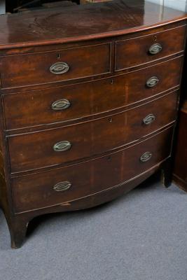 Appraisal: A George III mahogany bowfront chest circa the moulded top