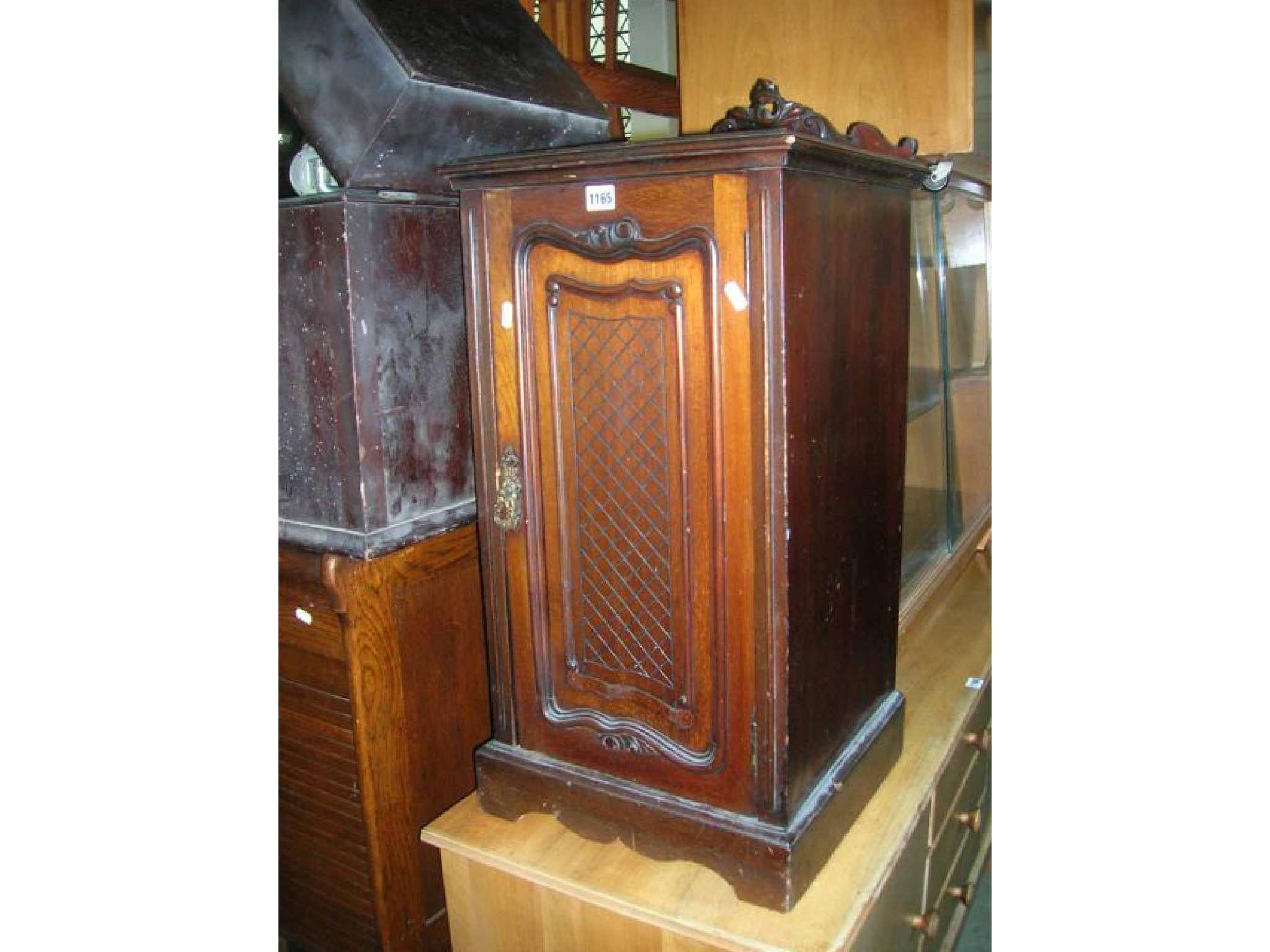 Appraisal: A late Victorian mahogany bedside cupboard enclosed by a moulded