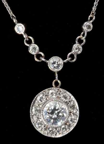 Appraisal: Edwardian Diamond Pendant Necklacecentering on one round brilliant cut diamond