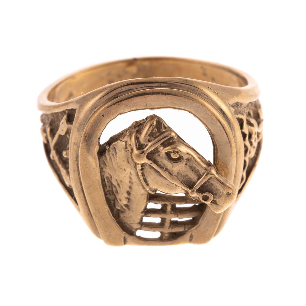 Appraisal: A Gold Equestrian Ring with Horse Horseshoe K yellow gold