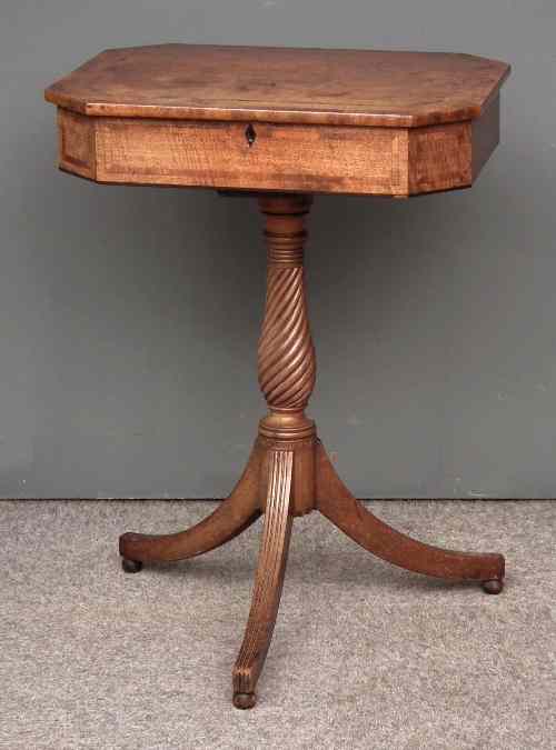 Appraisal: A George III mahogany octagonal occasional table with crossbanded top