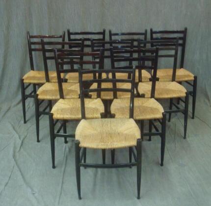 Appraisal: Midcentury Black Lacquer Chairs with Rush Type Seats From a