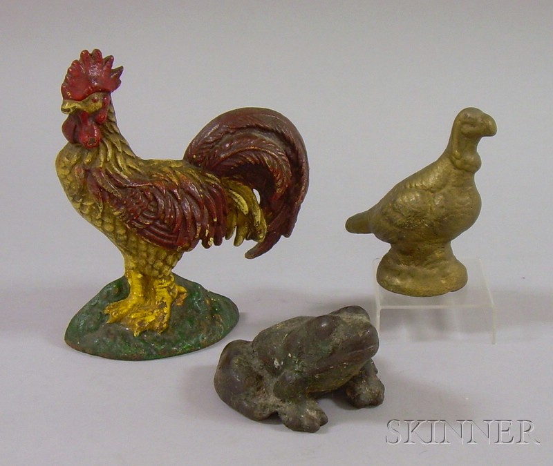 Appraisal: Three Painted Cast Iron Figural Doorstops a rooster frog and