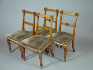 Appraisal: A set of four Victorian oak side chairs with rosette