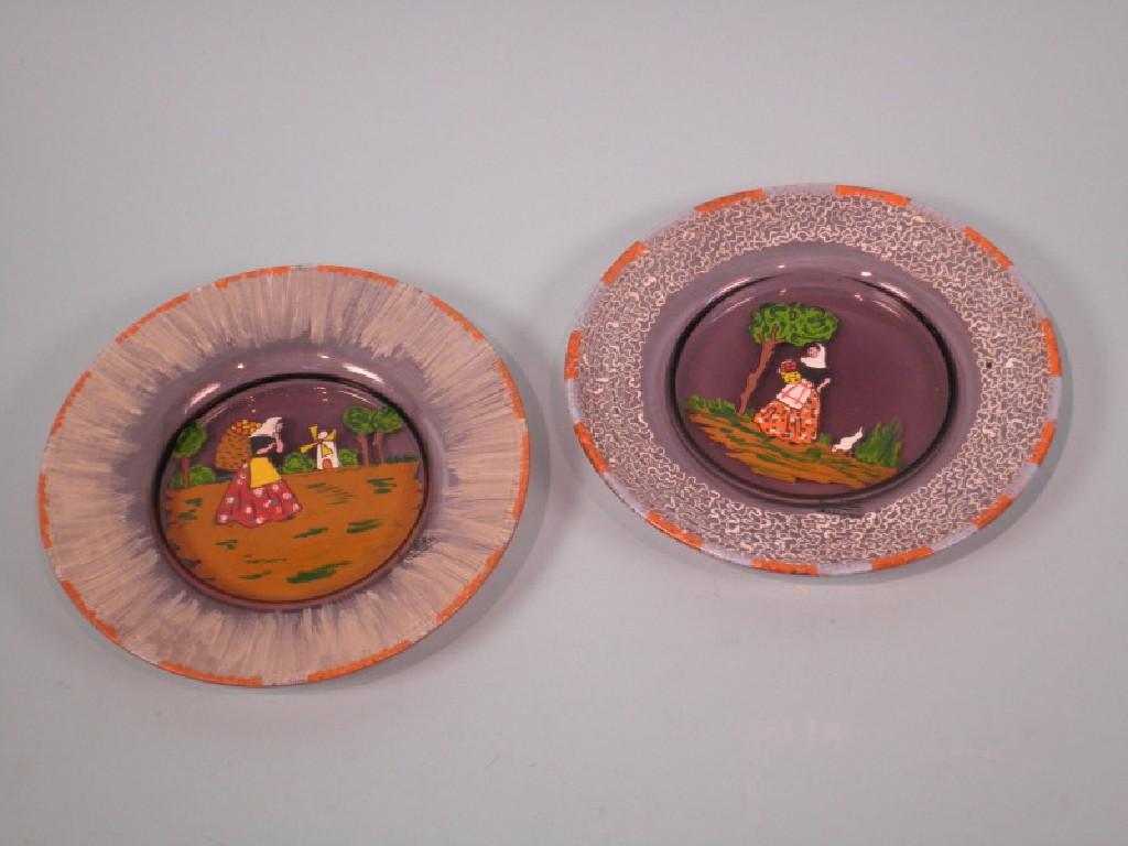 Appraisal: Two similar s Art Glass plates each decorated with female