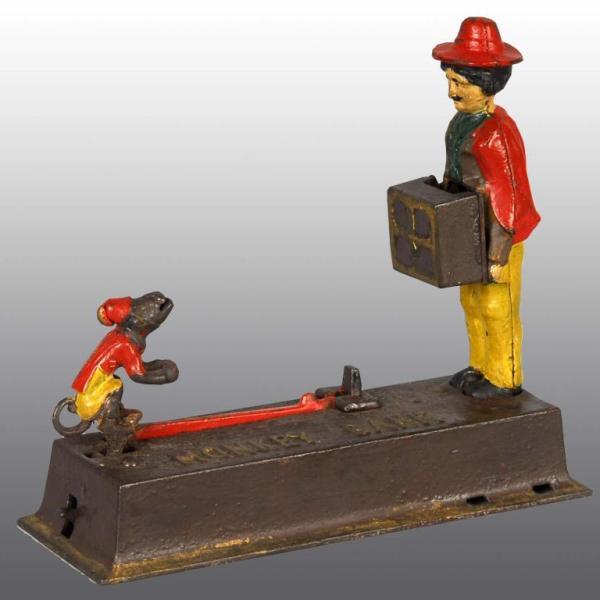 Appraisal: Cast Iron Monkey Mechanical Bank Description Manufactured by Hubley Manufacturing