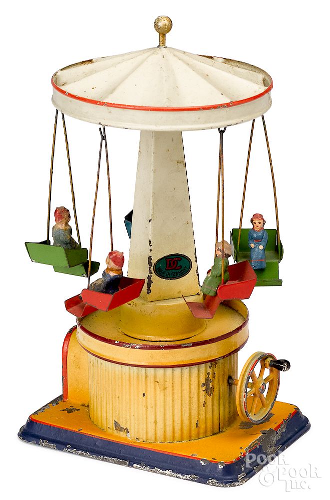 Appraisal: Painted tin flying carousel steam toy accessory Painted tin flying