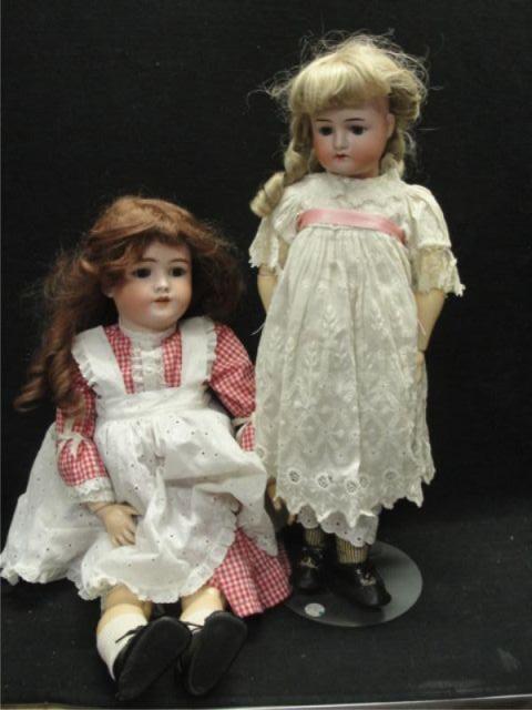 Appraisal: Two Porcelain Head Dolls One is high and reads made