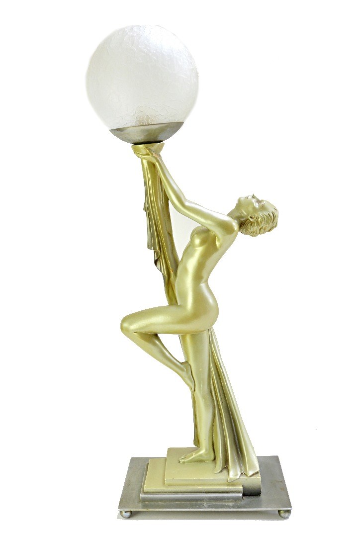 Appraisal: An Art Deco plaster figural table lamp modelled and cast