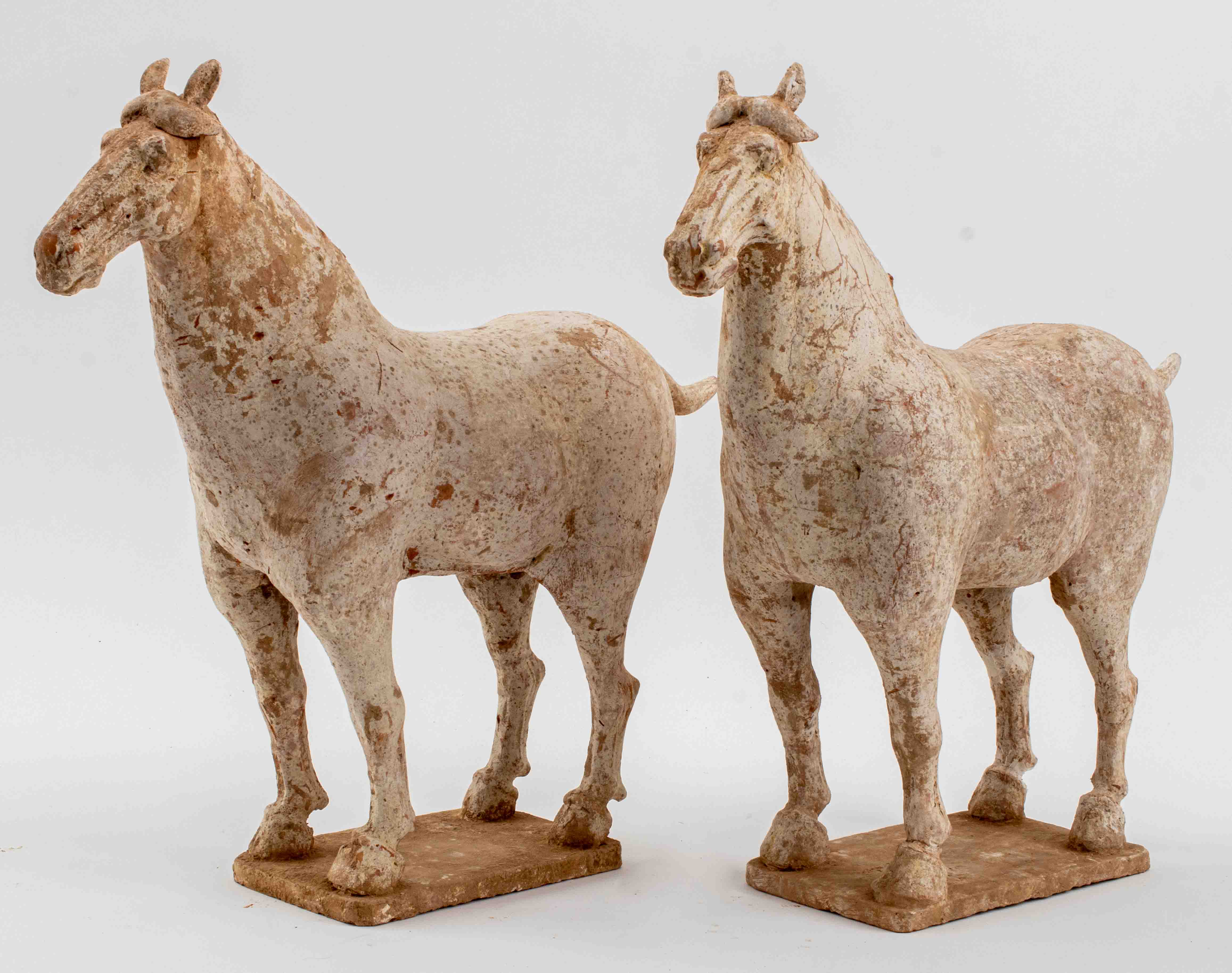 Appraisal: CHINESE TANG DYNASTY TERRACOTTA HORSES PAIR Pair of Chinese Tang