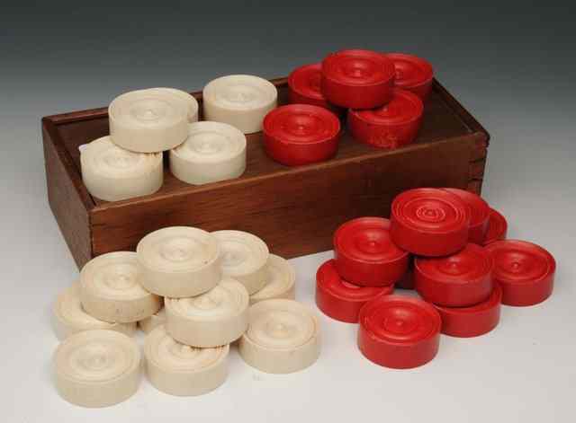 Appraisal: A SET OF CHINESE IVORY AND STAINED GAMES COUNTERS cased