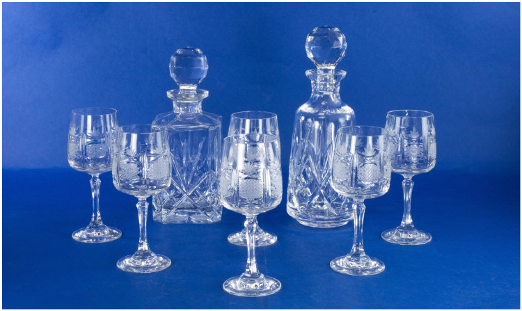 Appraisal: Two Crystal Decanters plus six etched wine glasses good quality