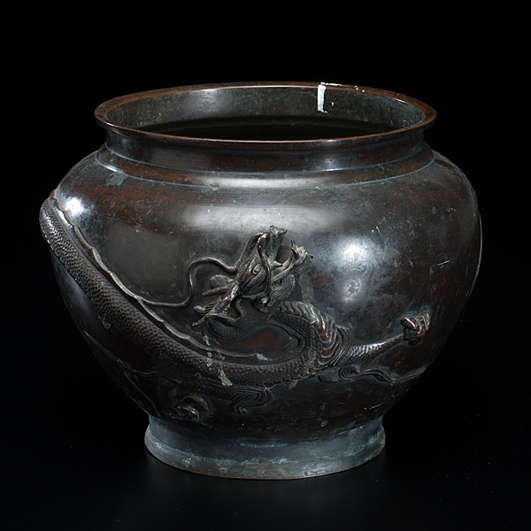 Appraisal: Japanese Meiji period A bronze planter cast in relief with