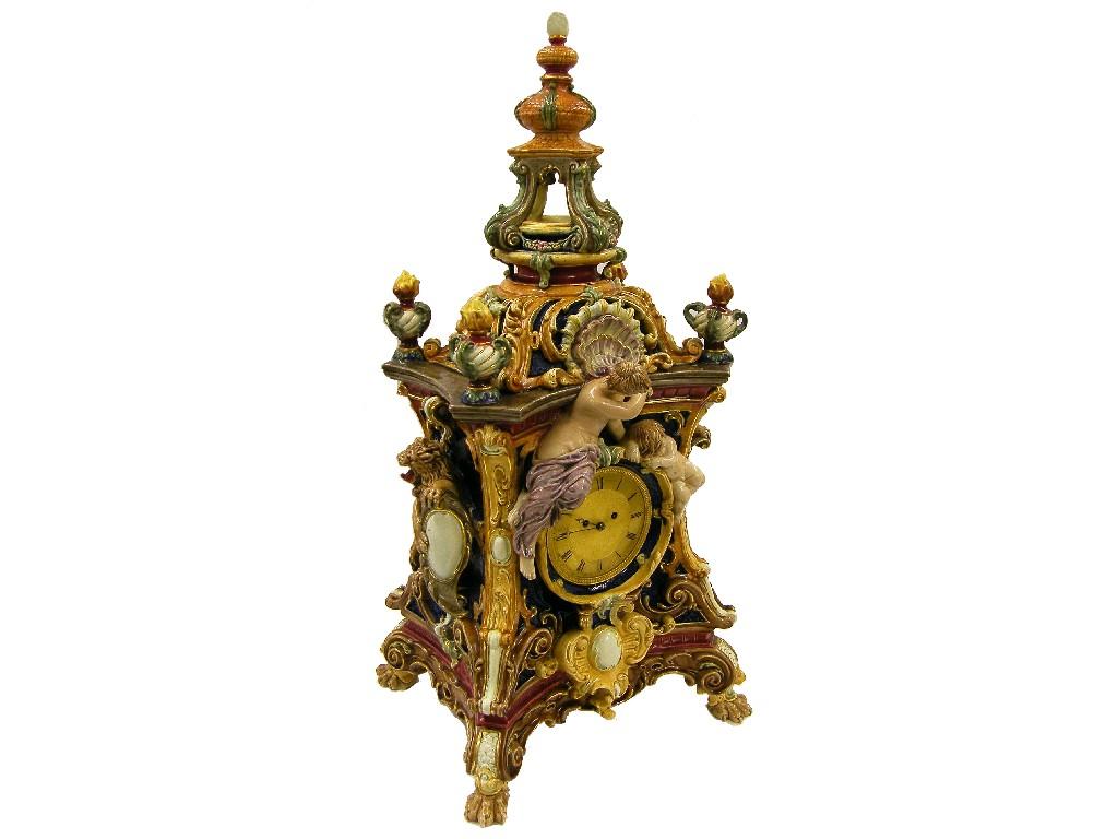 Appraisal: Impressive large majolica double fusee table clock striking on a