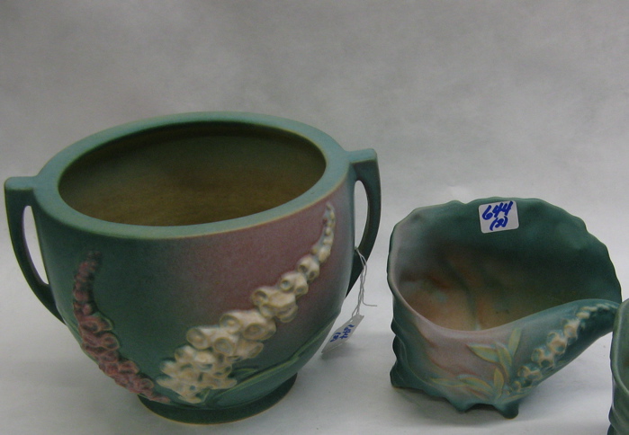 Appraisal: TWO ROSEVILLE POTTERY PIECES in the foxglove pattern a jardiniere