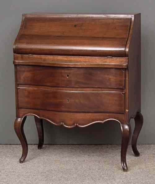 Appraisal: A Continental rosewood serpentine front bureau of th Century design