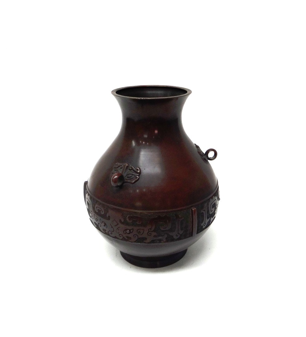 Appraisal: A Chinese archaic style bronze pear shaped vase circa decorated