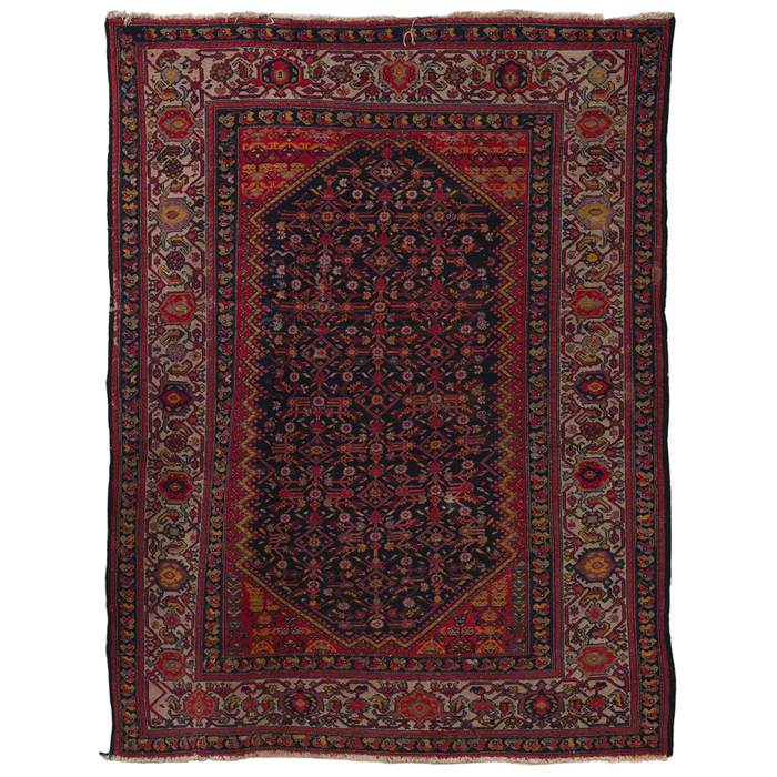 Appraisal: Persian rug c stylized floral design in reds and browns