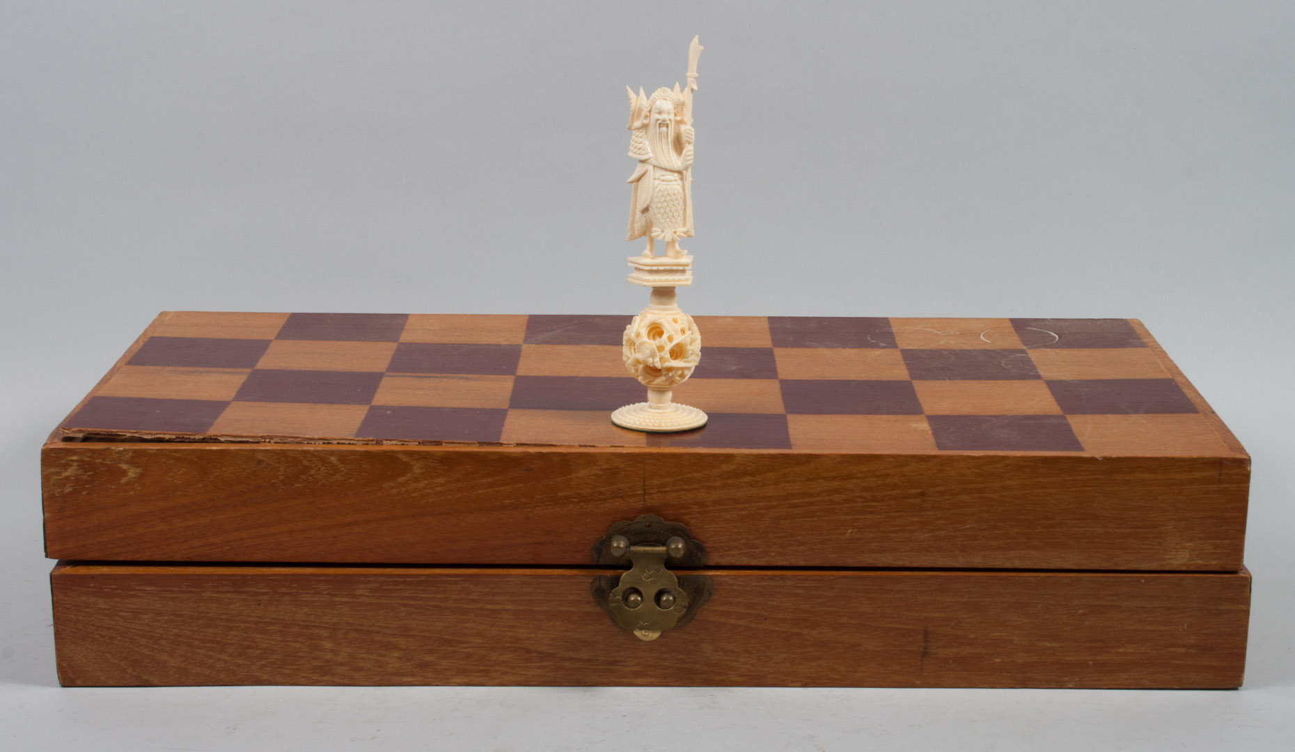 Appraisal: Chinese carved ivory chess set each piece on miniature puzzle