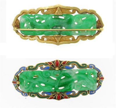 Appraisal: A jade brooch The rectangular jade plaque is carved and