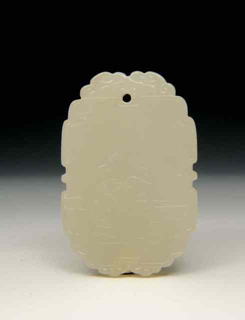 Appraisal: A CHINESE MUTTON FAT JADE PENDANT of rectangular plaque form