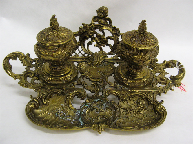 Appraisal: AN ART NOUVEAU STYLE ORNATE INKSTAND with double covered inkwells