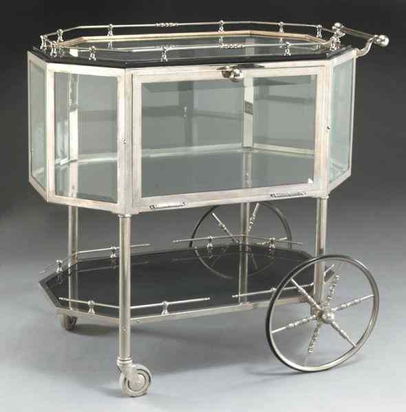 Appraisal: Art Deco chrome and glass serving trolleyhaving a removable mirrored