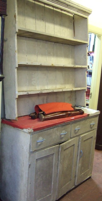 Appraisal: A th century white painted pine dresser the enclosed three