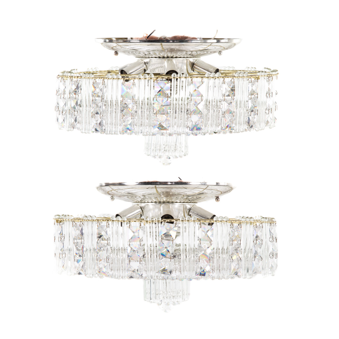 Appraisal: Pair of Luminaire crystal prism light fixtures brass frame with