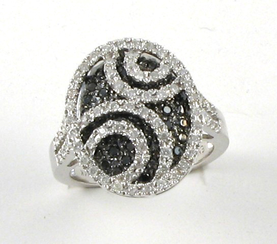 Appraisal: BLACK DIAMOND AND COLORLESS DIAMOND RING The top half of