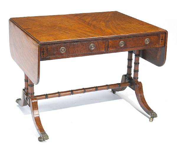 Appraisal: A Regency inlaid mahogany sofa table early th century The