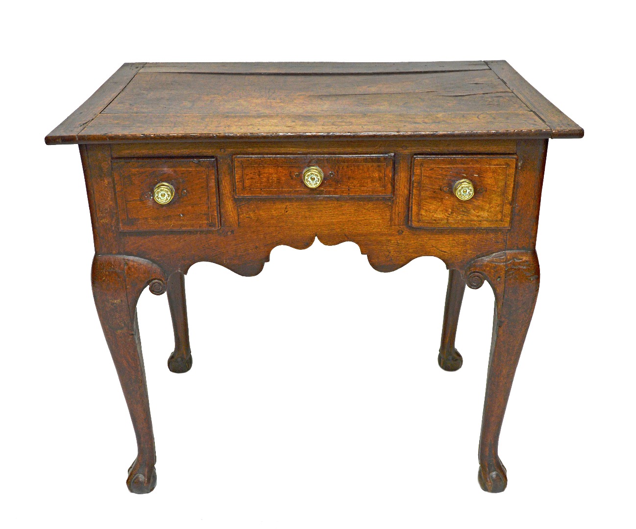 Appraisal: An th century oak lowboy with three drawers about the