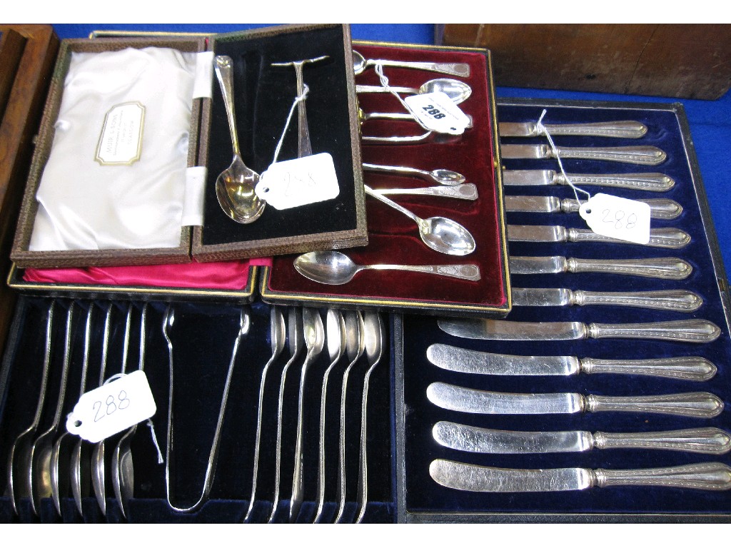 Appraisal: Lot comprising three cased cutlery sets and a silver spoon