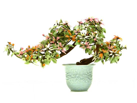 Appraisal: Asian hardstone bonsai form jade tree with pink salmon-colored and