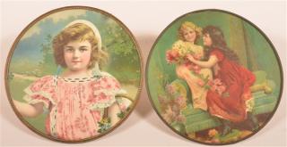 Appraisal: Two Flue Covers Depicting Children Paper lithograph in metal frames