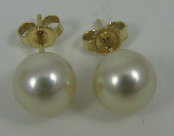 Appraisal: PAIR OF PEARL AND K GOLD EAR STUDS each set