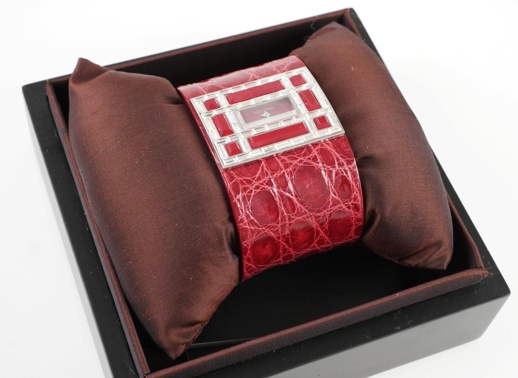 Appraisal: Womens Valentino Swiss made watch with genuine ruby or burgundy