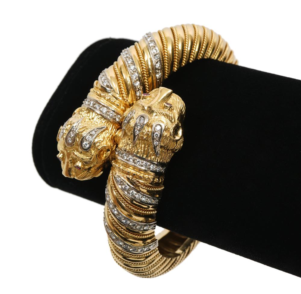 Appraisal: K YG DIAMOND DOUBLE PANTHER BANGLE BRACELET K yellow gold