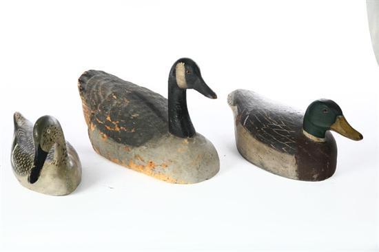 Appraisal: THREE DECOYS American th century wood Mallard drake with glass