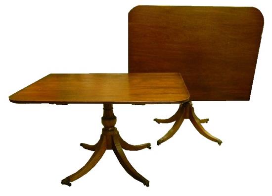 Appraisal: Georgian style tilt top dining table mahogany double pedestals with