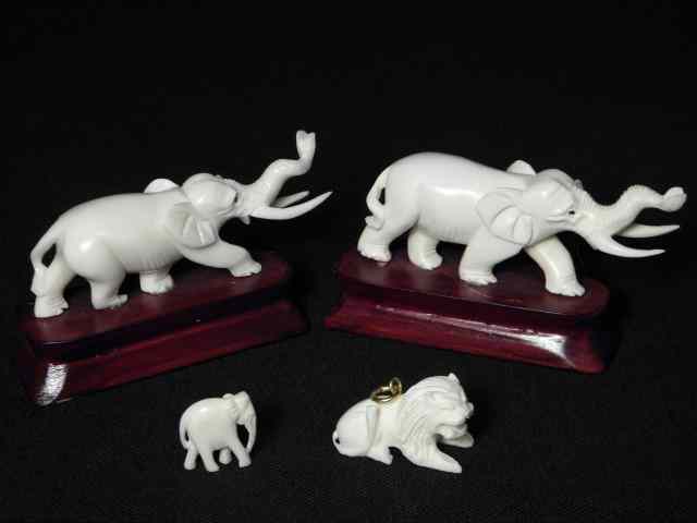 Appraisal: Lot of four miniature carved ivory animal figurines Includes a